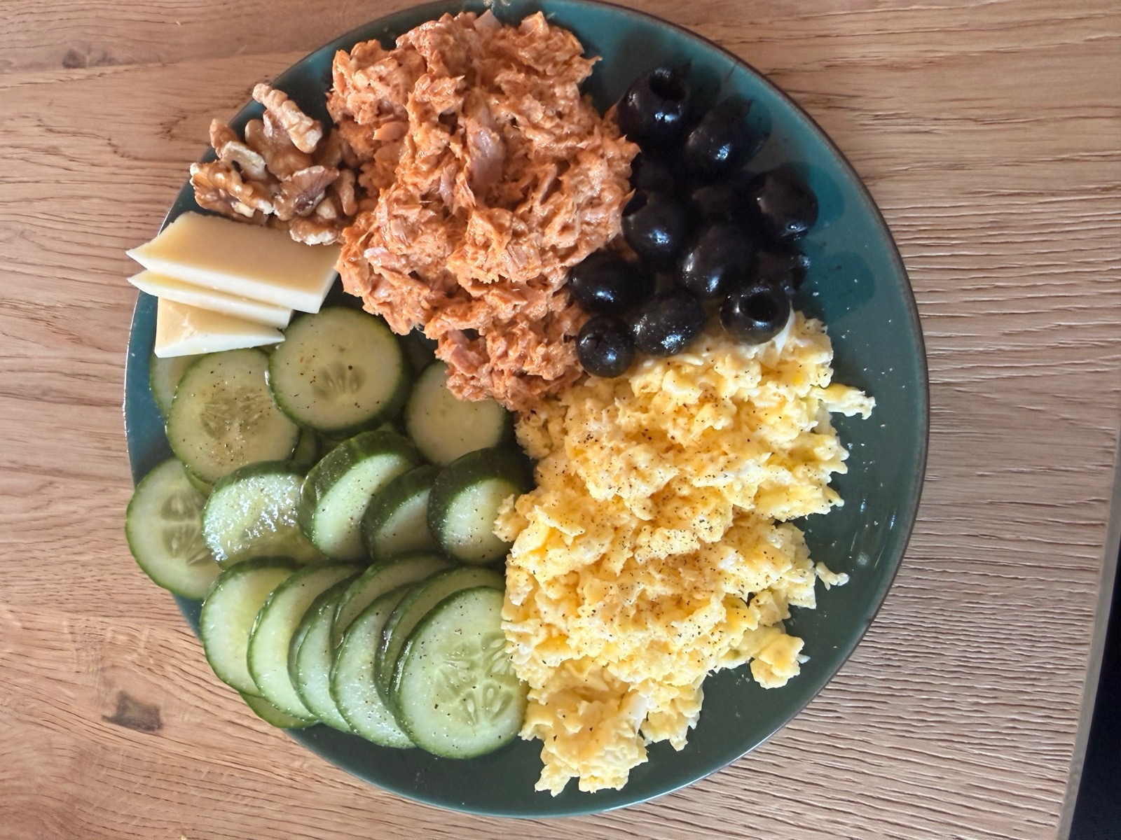 One of my real anchor lunches: tuna, eggs, cucumber, olives, nuts and cheese.